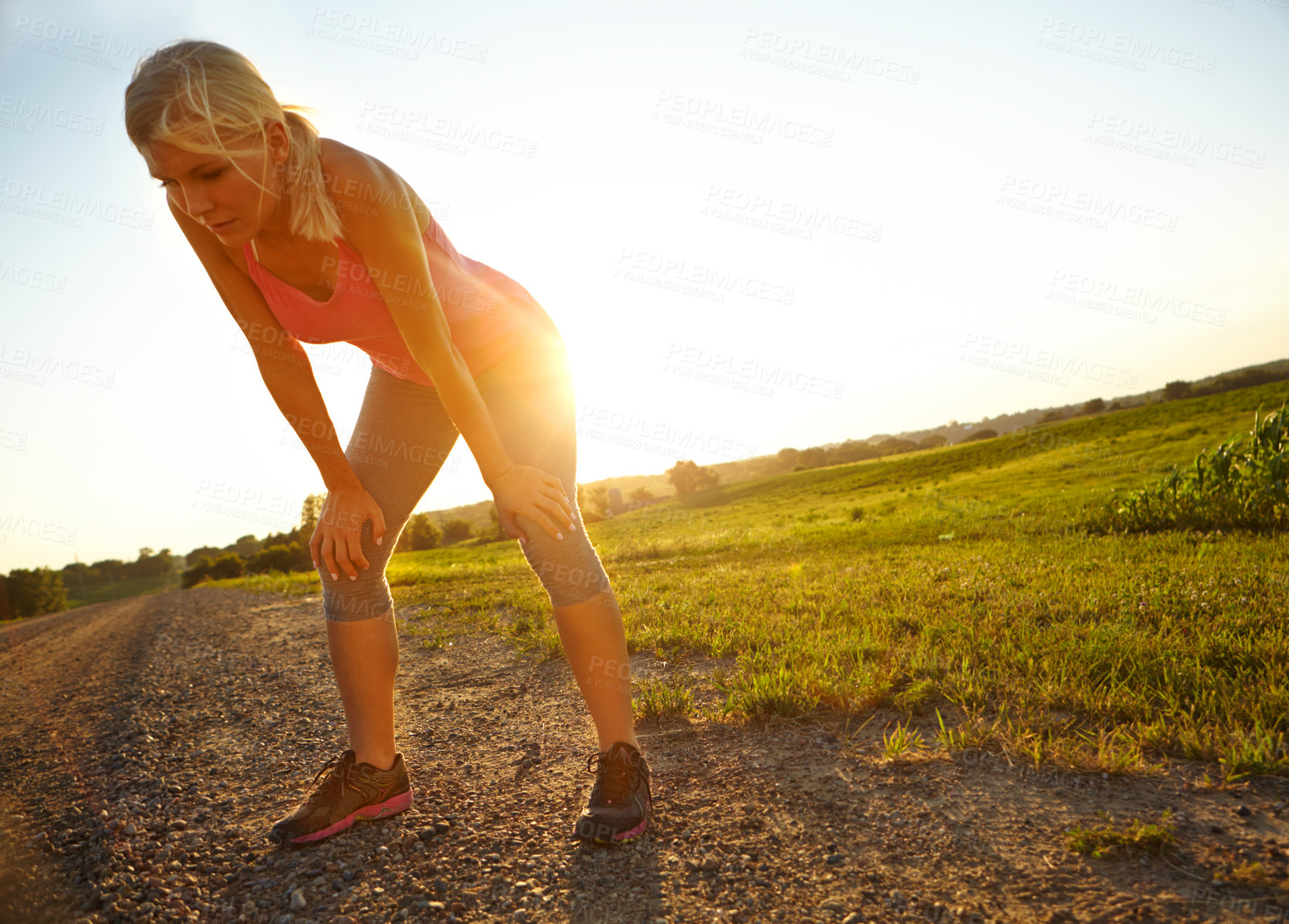 Buy stock photo Break, runner and woman with fatigue, exhausted and rest for wellness with exercise, training or health. Outdoor, tired and athlete with sportswear for workout, space or person in nature for practice