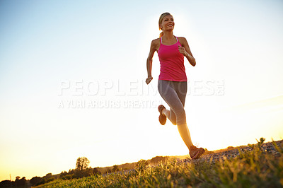 Buy stock photo Athlete fitness, woman and running outdoor for competition training, healthy body or cardio challenge. Mockup, blue sky and person exercise on low angle for morning jog, workout performance or energy