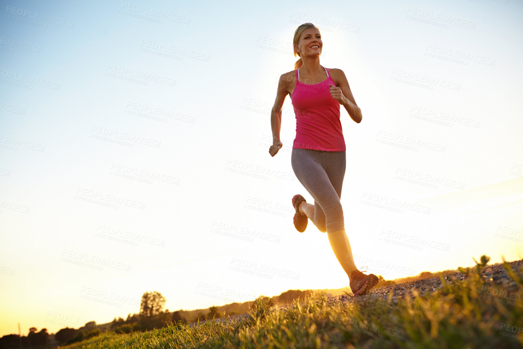 Buy stock photo Athlete fitness, woman and running outdoor for competition training, healthy body or cardio challenge. Mockup, blue sky and person exercise on low angle for morning jog, workout performance or energy