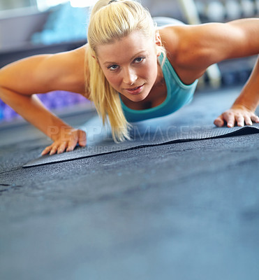 Buy stock photo Female athlete, push ups and portrait for sports, exercise and fitness for workout with yoga mat or balance. Woman, plank and performance in gym for training, strong muscle and toned body at pilates