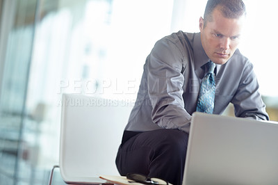 Buy stock photo Business, thinking and man with laptop, planning and online reading for financial report Person, investor and employee in office, computer and research for investment, email and problem solving