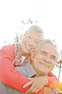 Buy stock photo Hug, romance and portrait with old couple in park for retirement, support and date. Love, marriage milestone and spring with senior man and woman walking in nature for wellness, bonding and smile