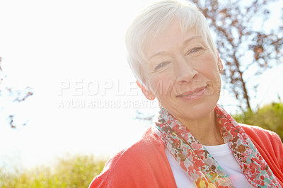 Buy stock photo Close up shot of a mature woman looking content