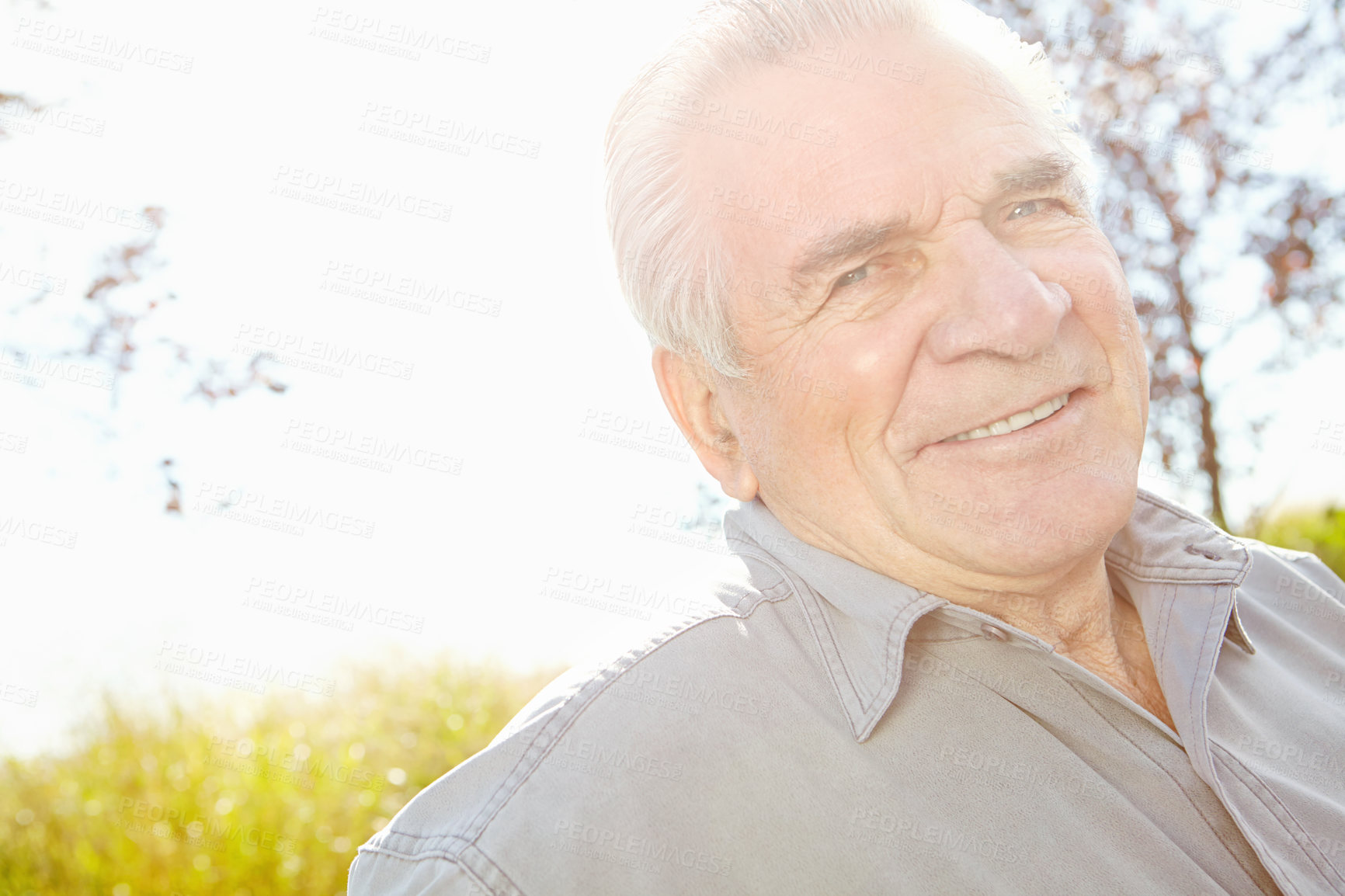 Buy stock photo Close up shot of a mature man smiling and looking at the camera