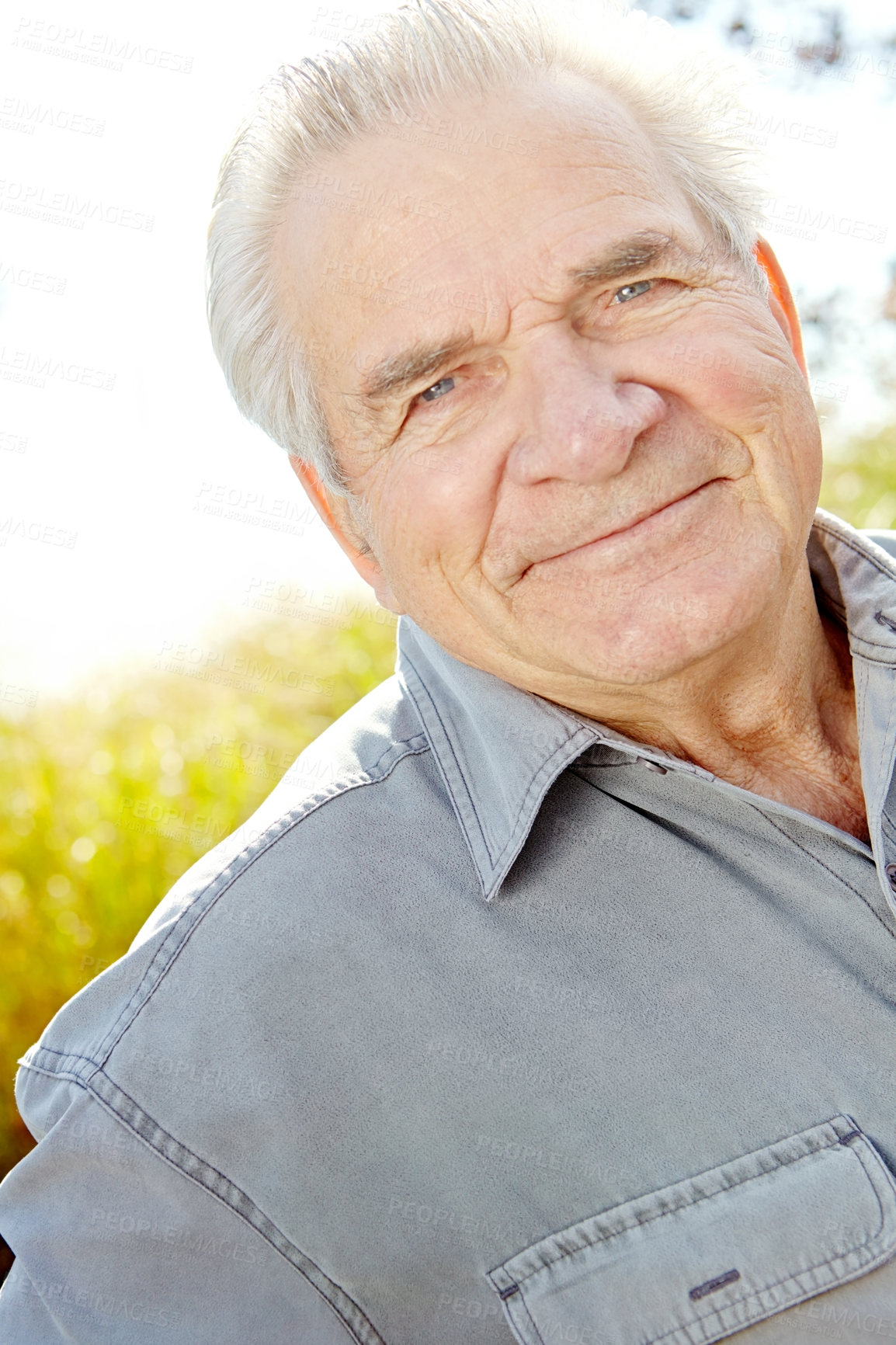 Buy stock photo Portrait of a mature man smiling at the camera