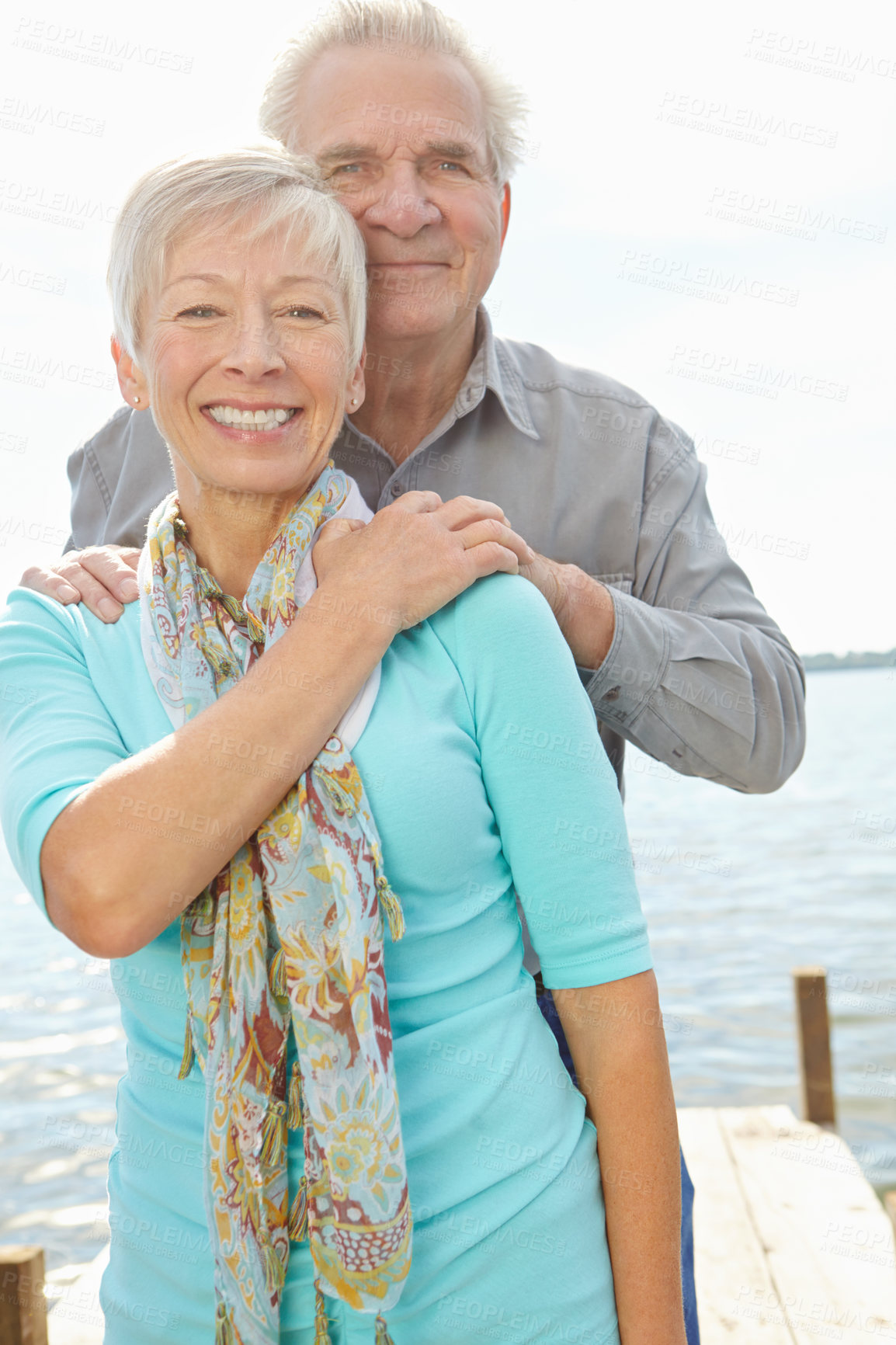 Buy stock photo Love, portrait and senior couple at lake for loyalty, strong relationship or connection on holiday. Vacation, happy man and woman by water pier outdoor for support, care or marriage in retirement