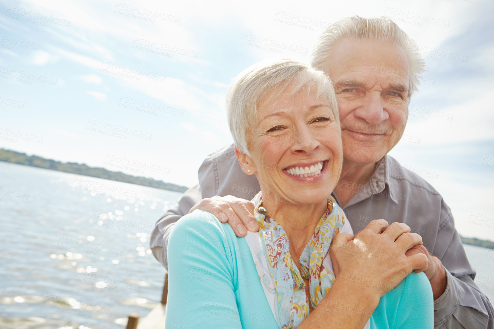 Buy stock photo Portrait, vacation and elderly couple at lake for love, holiday and relax together. Retirement, happy man and woman by water jetty outdoor for support, travel and romance in marriage in Australia