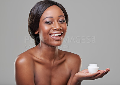 Buy stock photo Woman, skin cream and jar in studio portrait for product, cosmetics or change by gray background. Girl, model and African person with smile for beauty, skincare or serum in container for facial glow