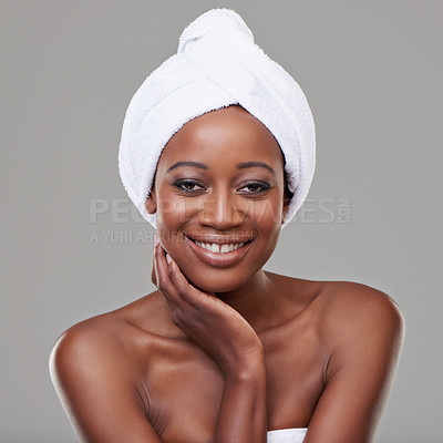 Buy stock photo Woman, portrait and towel in studio for skincare cleaning or healthy transformation, shower or grey background. Black person, face and smile for morning routine with dermatology, hygiene or mockup