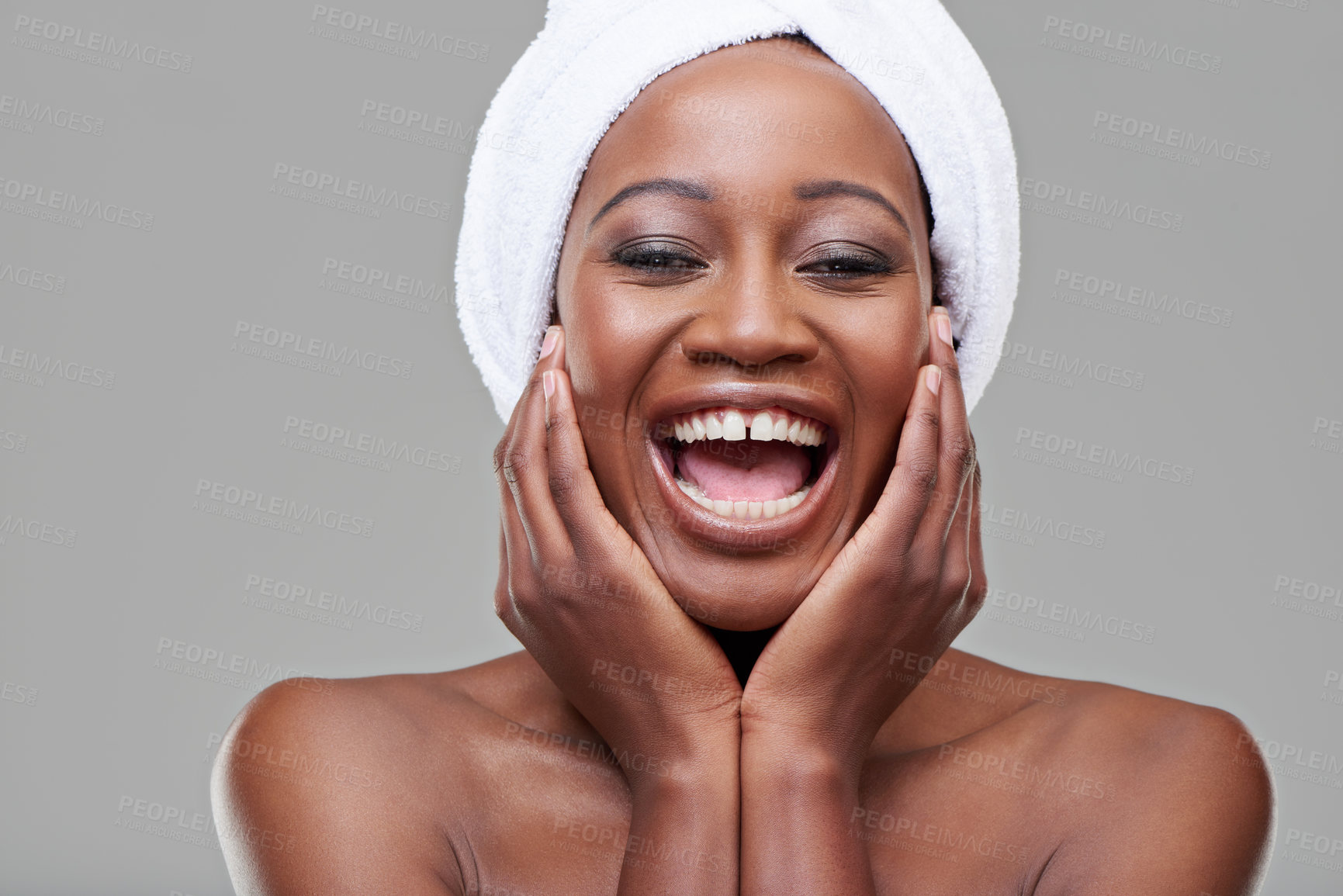 Buy stock photo Studio shot of a young woman with beautiful skin being cheerful