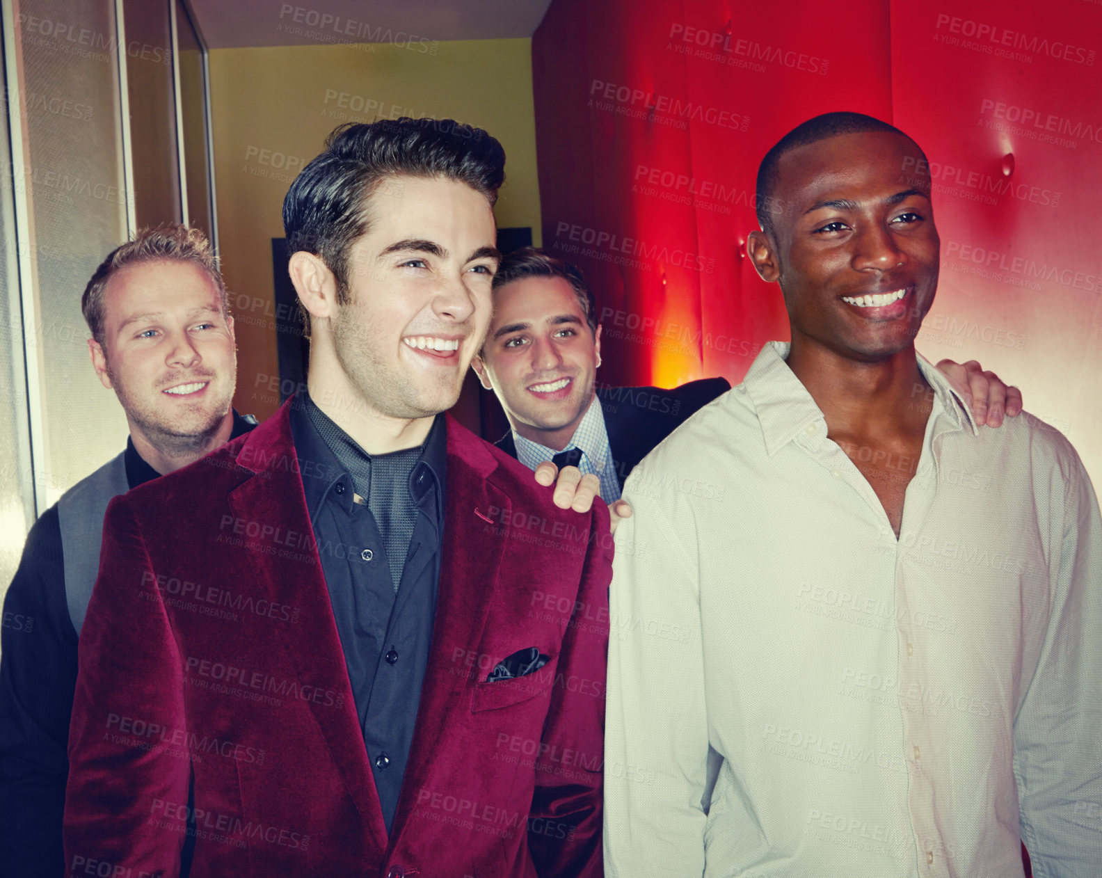 Buy stock photo A group of smartly dressed men arriving at a nightclub together