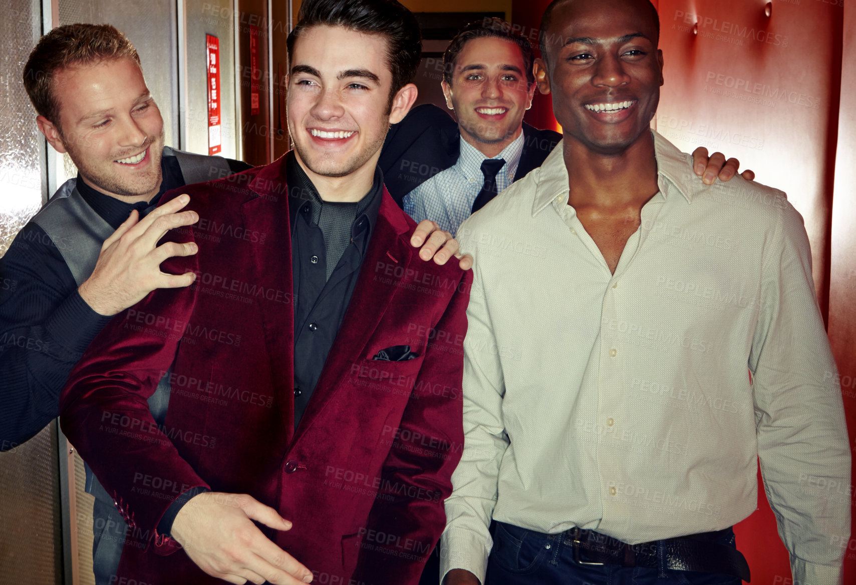 Buy stock photo A group of smartly dressed men arriving at a nightclub together