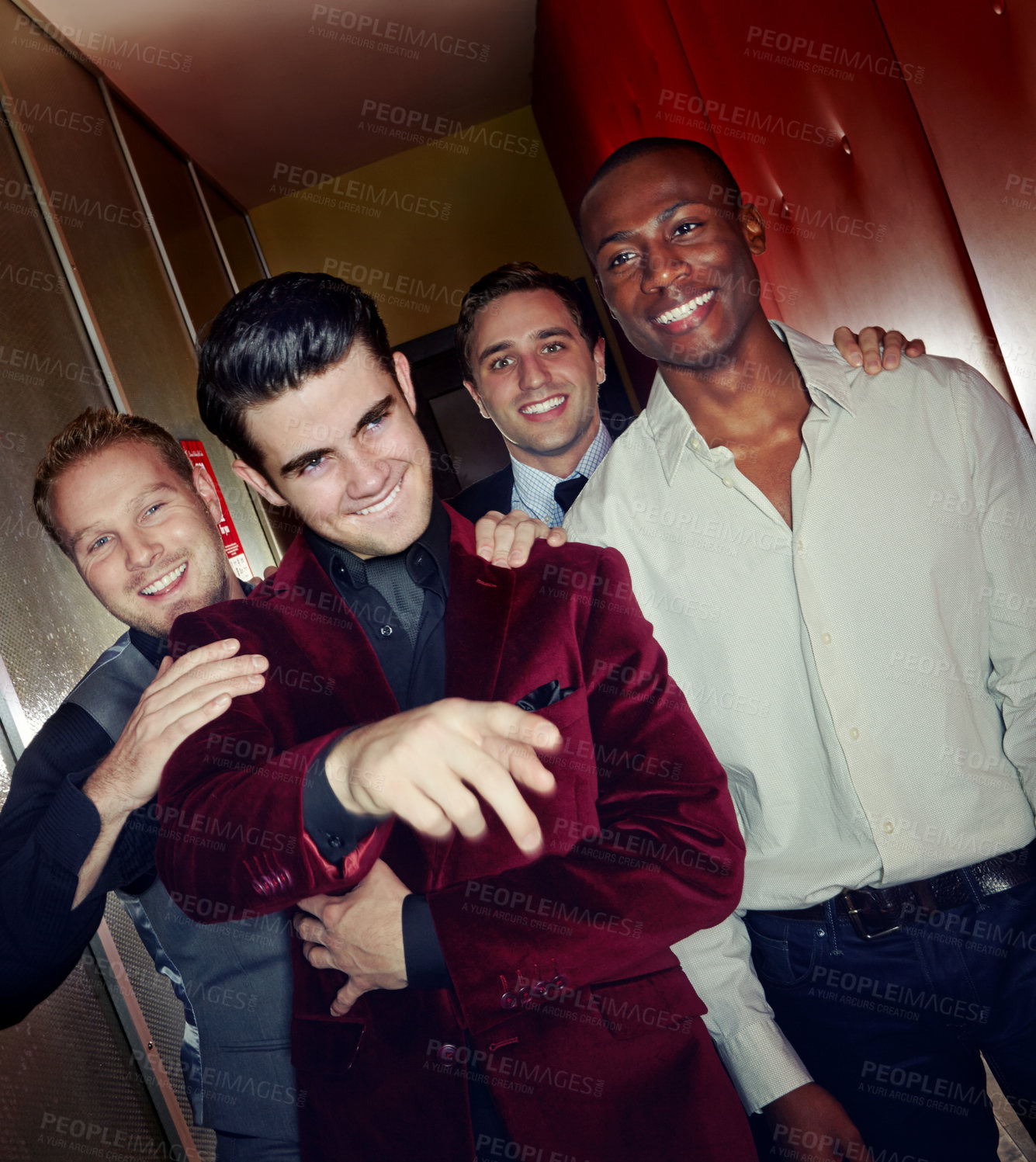 Buy stock photo A group of smartly dressed men arriving at a nightclub together