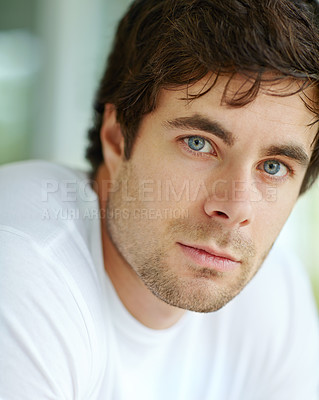 Buy stock photo A head and shoulders cropped shot of a handsome young man