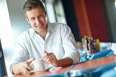 Buy stock photo Man, smile and portrait at cafe with coffee cup, relax and confidence with espresso, cappuccino and caffeine. Person, happy and pride with tea, drink and start morning at restaurant in Australia