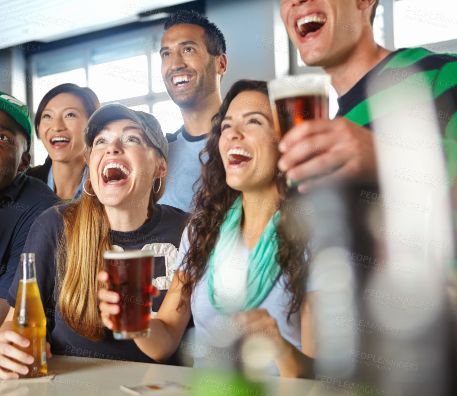 Buy stock photo Pub, sports and group of excited fans with beer watching soccer match with happiness for winning goal. Support, alcohol and friends streaming broadcast television of football game for league in bar.