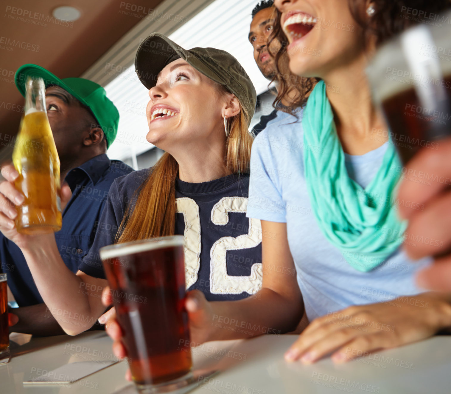 Buy stock photo Pub, winning and group of sports fans with beer watching soccer match with happiness for goal. Supporters, alcohol and friends streaming broadcast television of football game for league in bar.