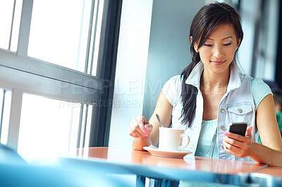 Buy stock photo Communication, online and woman with smartphone, cafe and message for contact, internet dating and chat. Happy, reading and person with mobile in coffee shop, tea cup and texting with technology