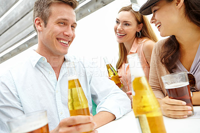 Buy stock photo Beers, people and friends in restaurant, smile and bonding together with reunion. Group, alcohol and pub service with man, women and conversation with joy, chatting and happy hour with break