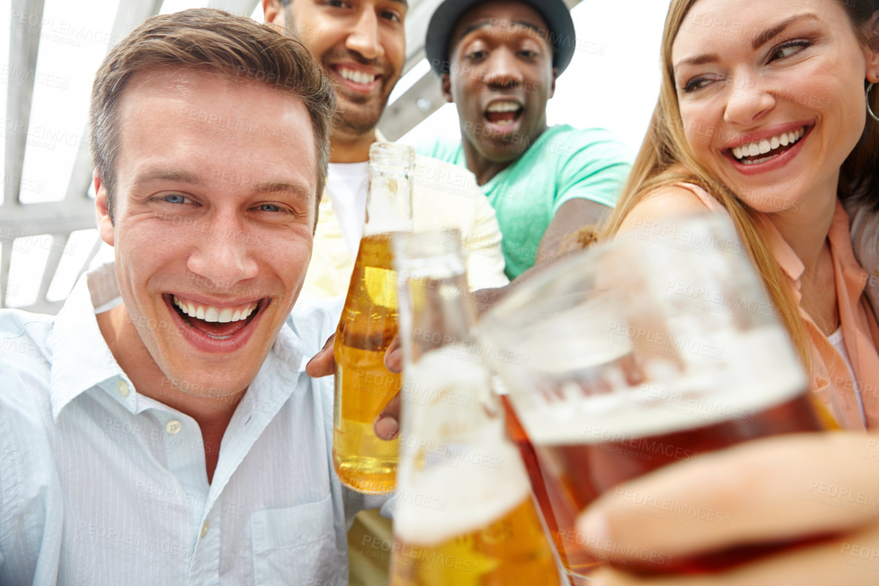 Buy stock photo Closeup portrait of a group of friends enjoying drinks together