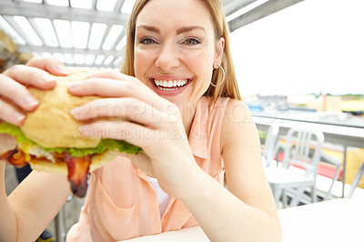 Buy stock photo Portrait, happy and woman with burger, restaurant or influencer with review for  lunch or promotion. Vlogger, excited and person with fast food in diner, customer experience or wow for meal in Canada