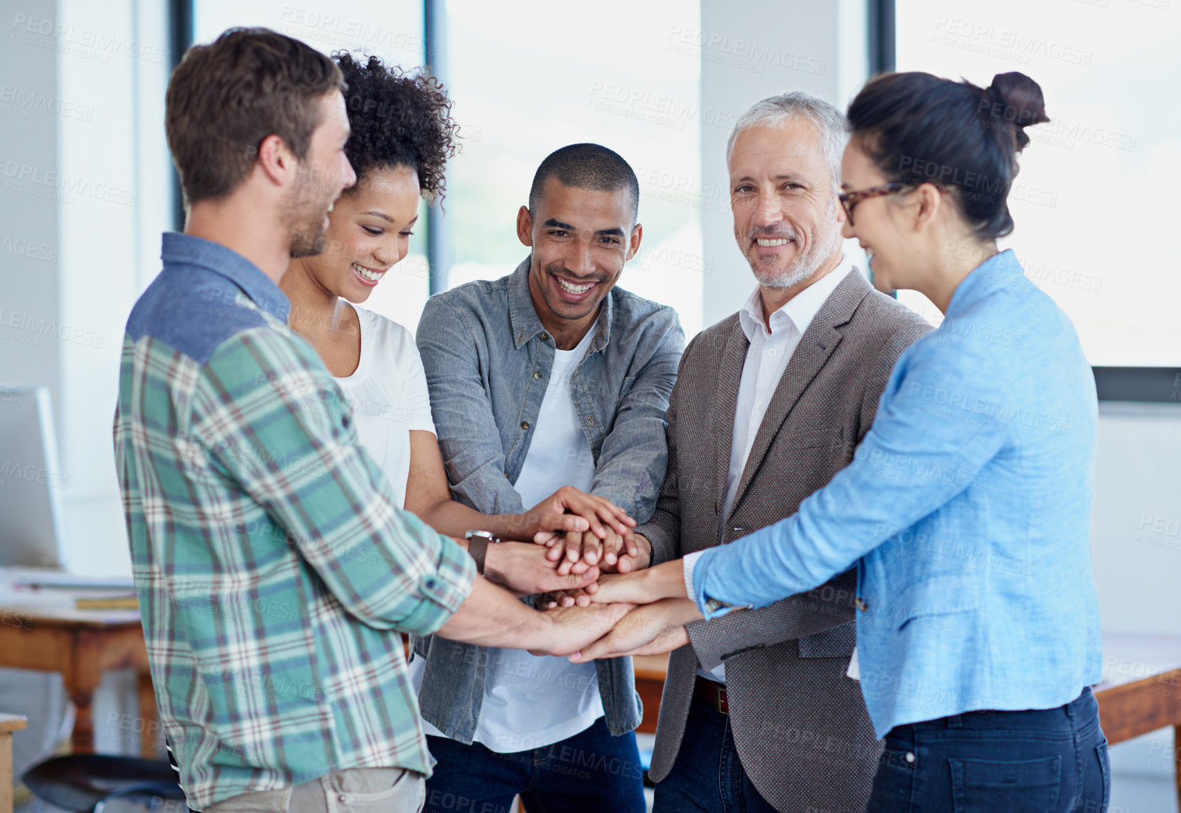 Buy stock photo Business, people and hands stack in workplace, success huddle and together for teamwork motivation in creative office. Celebrating, work deal and group target, employees and professional in meeting
