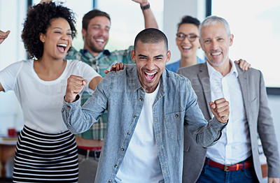 Buy stock photo Celebration, teamwork and businessman with colleagues in office for success, achievement or project goal. Diversity, cheering and happy employees for winning collaboration, company deal or victory