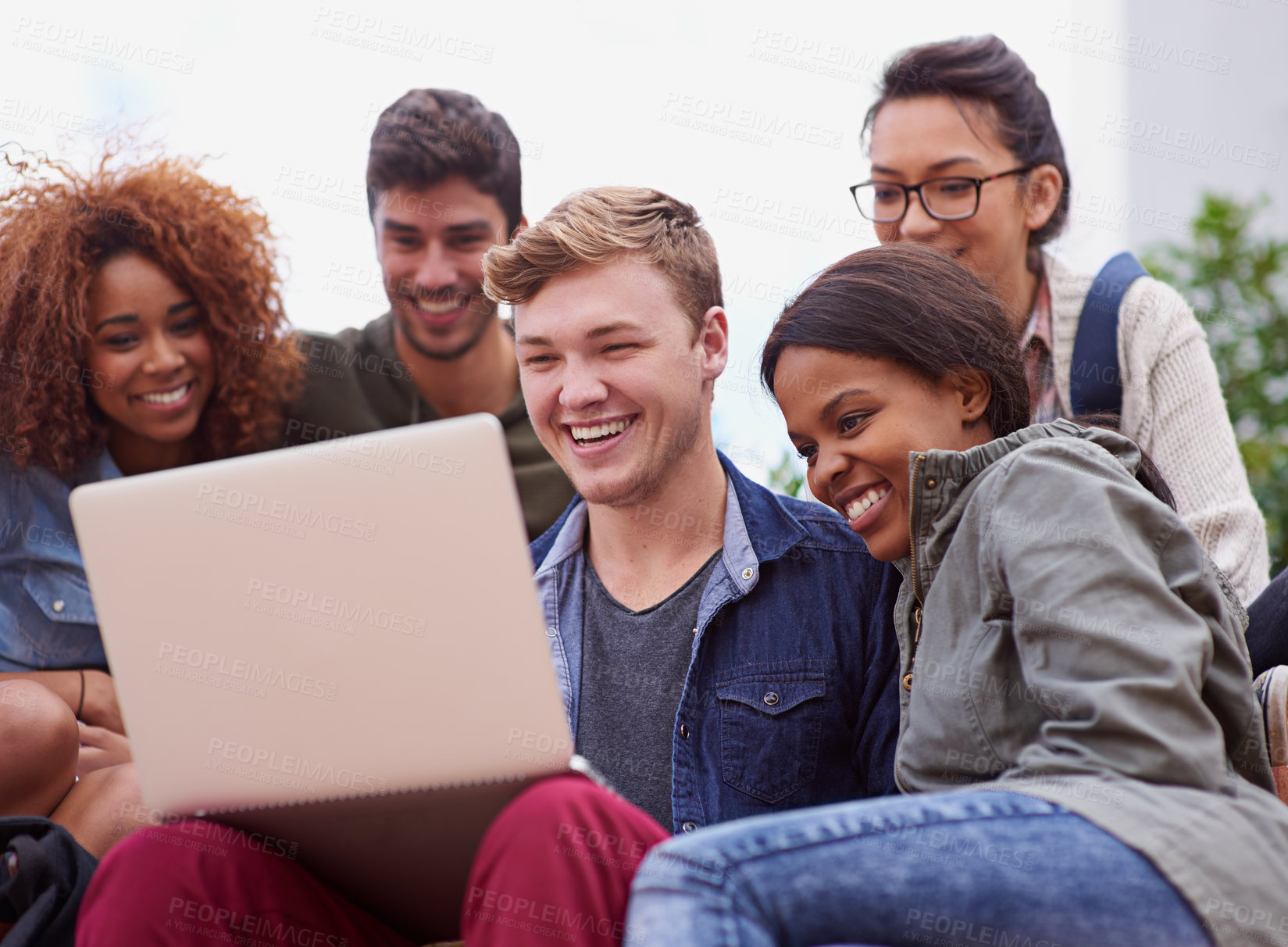 Buy stock photo Laptop, laughing and group of students outdoor on university e learning app, online class or remote studying. Happy diversity people, youth or friends on college campus, computer or digital education