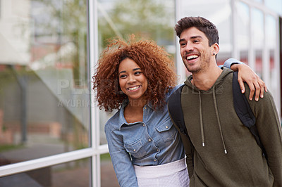 Buy stock photo Students, couple and walking at school for university, love and study with smile or hug. Man, woman and strolling outdoor on campus for college, relationship and education with backpack for learning
