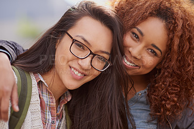 Buy stock photo Cropped shot of girlfriends bonding on campus
