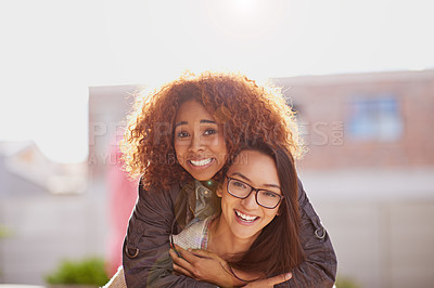 Buy stock photo Friends, women and piggyback with portrait outdoor, playful and fun for bonding, happiness and travel together. Playing, love and support, energy and freedom with trust in friendship for adventure