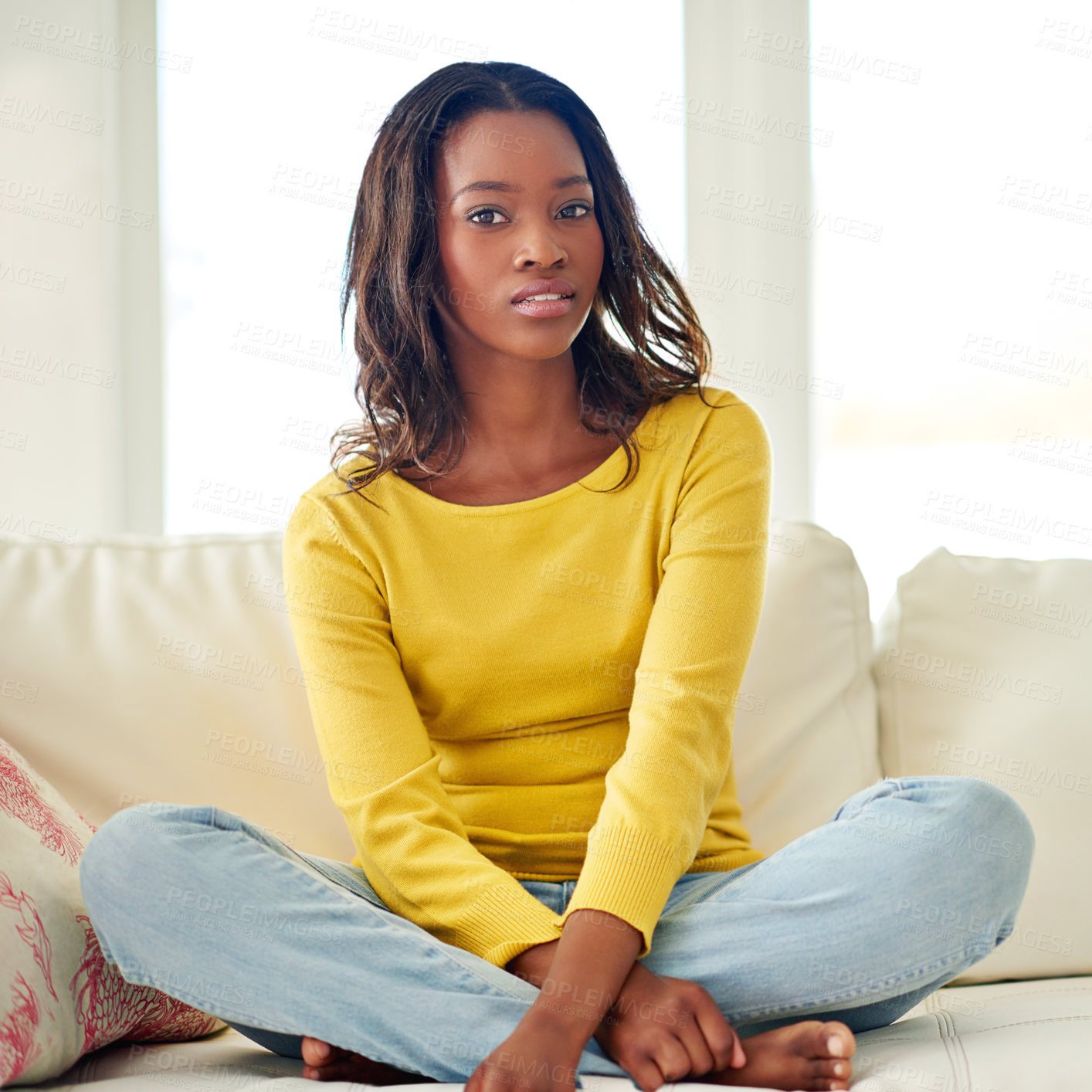 Buy stock photo Portrait, black woman and couch for relax in home, weekend and rest in apartment. Living room, calm and confidence on sofa for female person, introvert and peace in house and chill alone in lounge