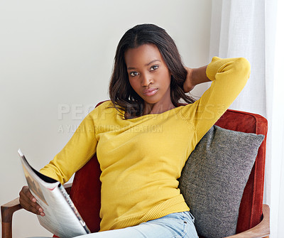 Buy stock photo Black woman, portrait or home for fashion with magazine or relax, reading for winter trend or style. Female person, beauty or confidence in living room with book for clothes, cool and casual in house