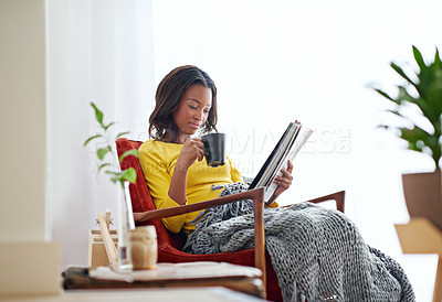 Buy stock photo Cropped shot of an attractive young woman relaxing at home