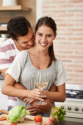 Buy stock photo Cooking, portrait and happy couple hug in kitchen for healthy food or vegetables for lunch or dinner. Smile, wine and romantic woman in meal prep for salad preparation or hungry vegan man in home