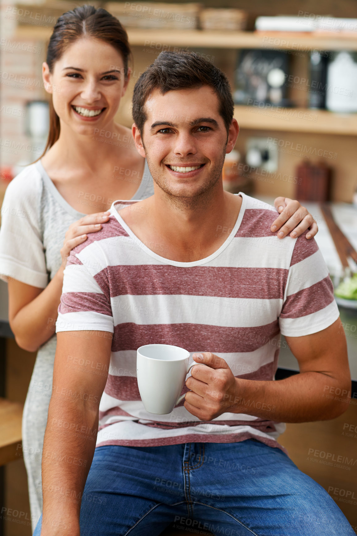 Buy stock photo Couple, relax and portrait in home with coffee in morning for energy, benefits and happiness. Woman, support and care for partner with preparation of drink in kitchen with espresso, latte and love