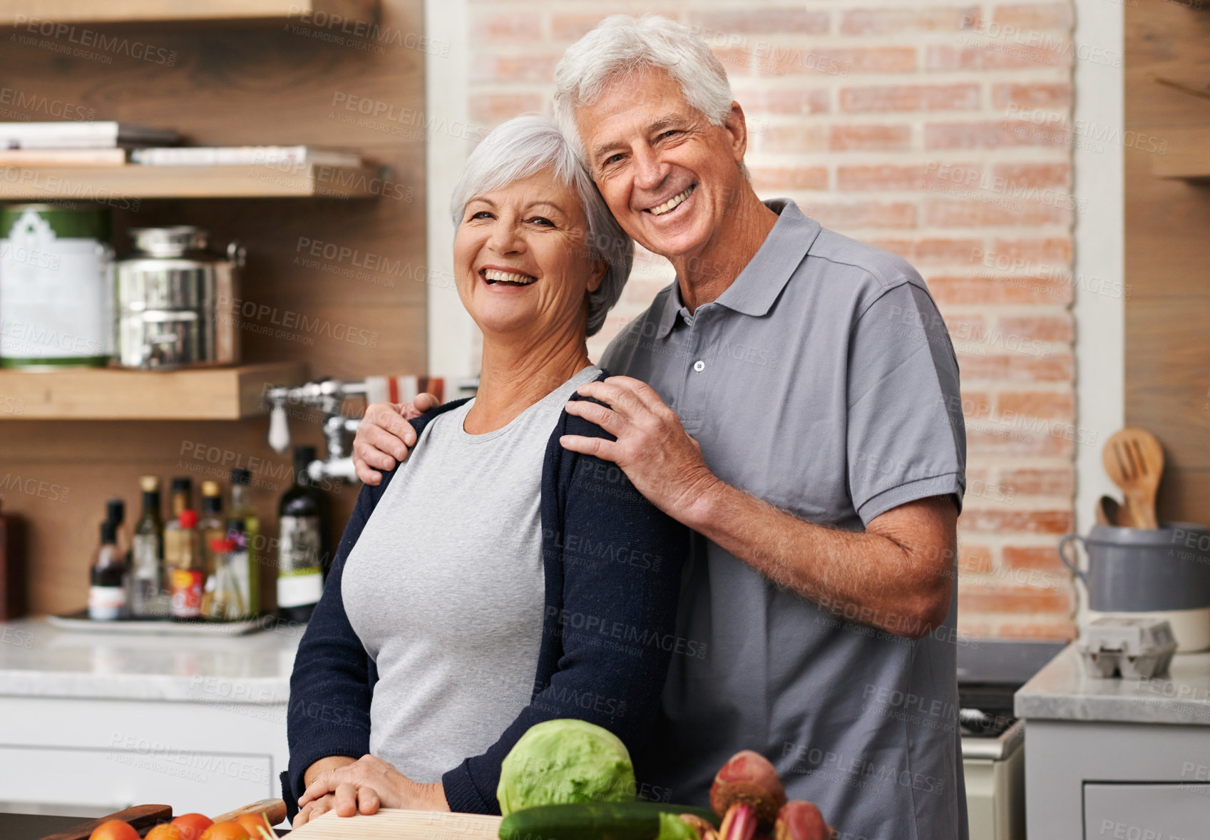 Buy stock photo Senior couple, happy and love in kitchen for commitment, health and retirement in apartment for wellness. Elderly man, woman and cooking together in house for lunch, marriage and mature partnership.