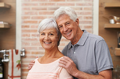 Buy stock photo Senior couple, happiness and portrait in kitchen for commitment, health and retirement in apartment for wellness. Elderly man, woman and hug in house for partnership, marriage and memories at home.