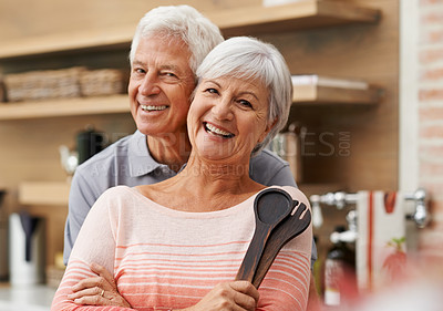 Buy stock photo Elderly, couple and happiness with kitchen tools for love, commitment and health in apartment for retirement. Mature man, woman and cooking together in house for lunch, marriage and senior partner.