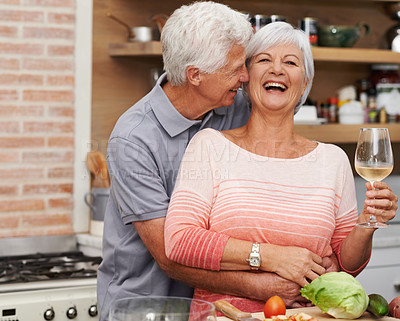 Buy stock photo Shot of a mature husband intimately embracing his wife