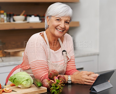 Buy stock photo Portrait, old woman and online for cooking and tablet in kitchen and watch for learning, meal prep and guide. House, senior and female person in home, healthy and food, salad and recipe, video or app