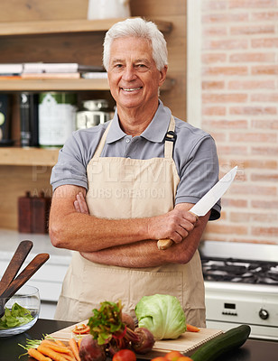 Buy stock photo Senior man and arms with knife in kitchen or confident, tomato and carrots for diet. Male chef and portrait with healthy vegetables for nutrition, peeling green lettuce with onion in retirement home