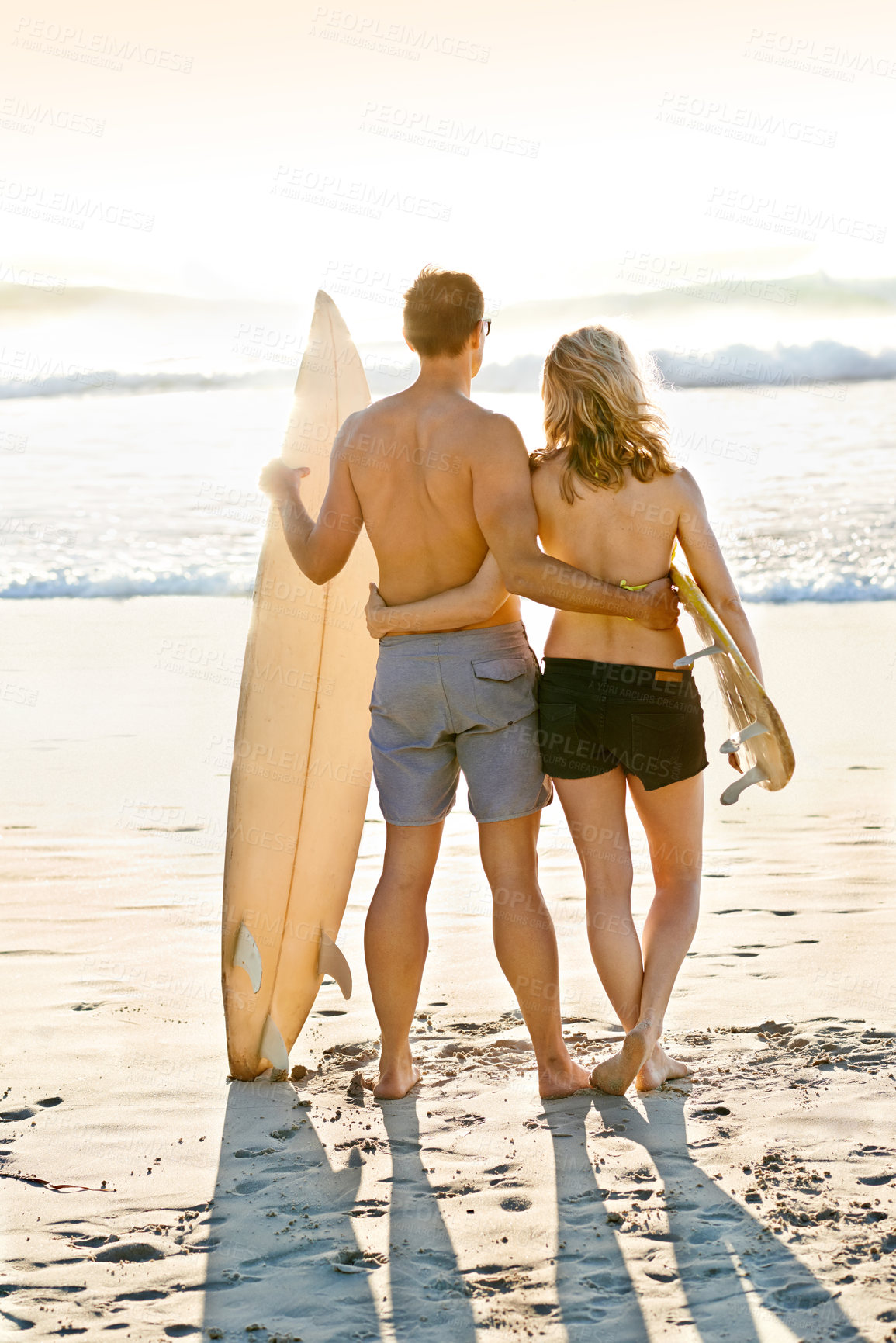 Buy stock photo Surfboard, hug or couple at sea for adventure, anniversary or sports exercise in Miami, Florida. Healthy surfers, back view or people ready for surfing on holiday vacation at beach or ocean in summer