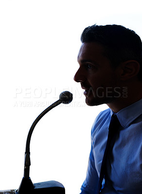 Buy stock photo Businessman, silhouette and talking with mic for speech, presentation or discussion on a white studio background. Man, politician or business spokesperson in conversation, speaker or desk microphone