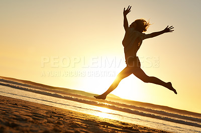 Buy stock photo Silhouette, woman and jump at beach for sunset, happiness and celebration in nature for freedom. Energy, success and wellness in Bali for holiday, adventure and ocean in summer on tropical island.
