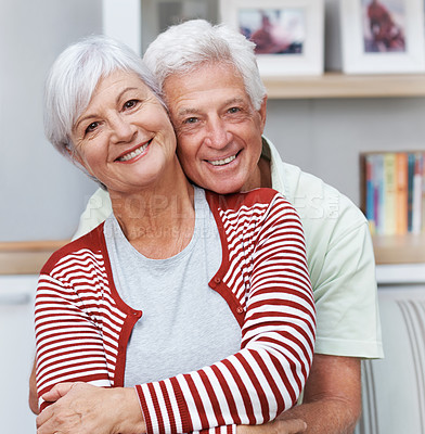 Buy stock photo Senior couple, portrait and face with smile, love and care together for quality time at home. Happy elderly man, old woman and embrace in hug for relax retirement, loyalty and support of happiness 