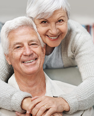 Buy stock photo Senior, happy couple and portrait smile with hug for love, romance or embrace in relationship or marriage at home. Elderly woman face hugging man smiling for care or bonding together in retirement
