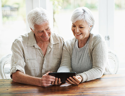 Buy stock photo Tablet, happy senior couple and online in house with social media, reading news app and ebook. Retirement, old man and woman with digital technology for subscription, streaming and network connection