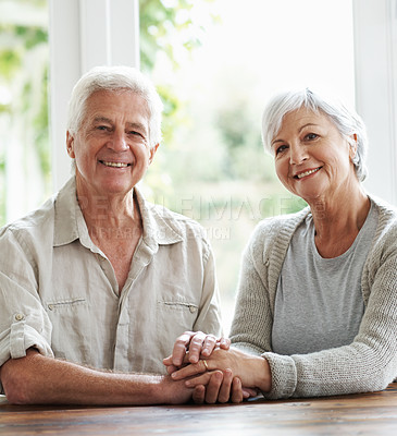 Buy stock photo Portrait, smile and senior couple holding hands in support, love and relax together at home. Happy old man, woman and helping hand for trust, care and loyalty to life partner, respect and gratitude