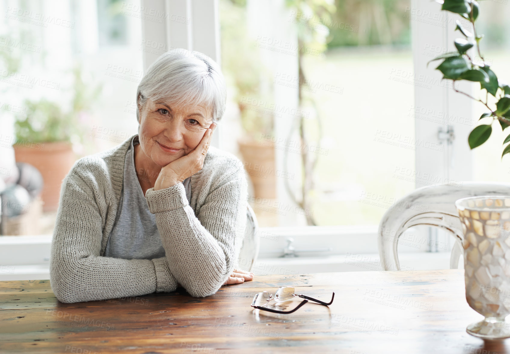 Buy stock photo Portrait of senior woman, smile and relax in home for retirement and good mood. Face of happy elderly lady and person in house for happiness, confidence and wisdom of ageing, wrinkles or grey hair 